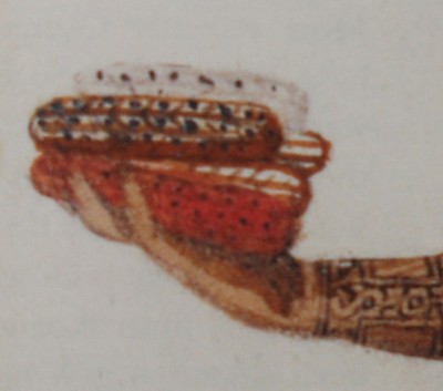 Figure 5. Detailed view of figure 3, showing maize cobs in the woman’s right hand.